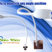 Teeth Whitening clip Dental System LED sul desktop con la luce 2 occhiali e 20 colori Shadeguide